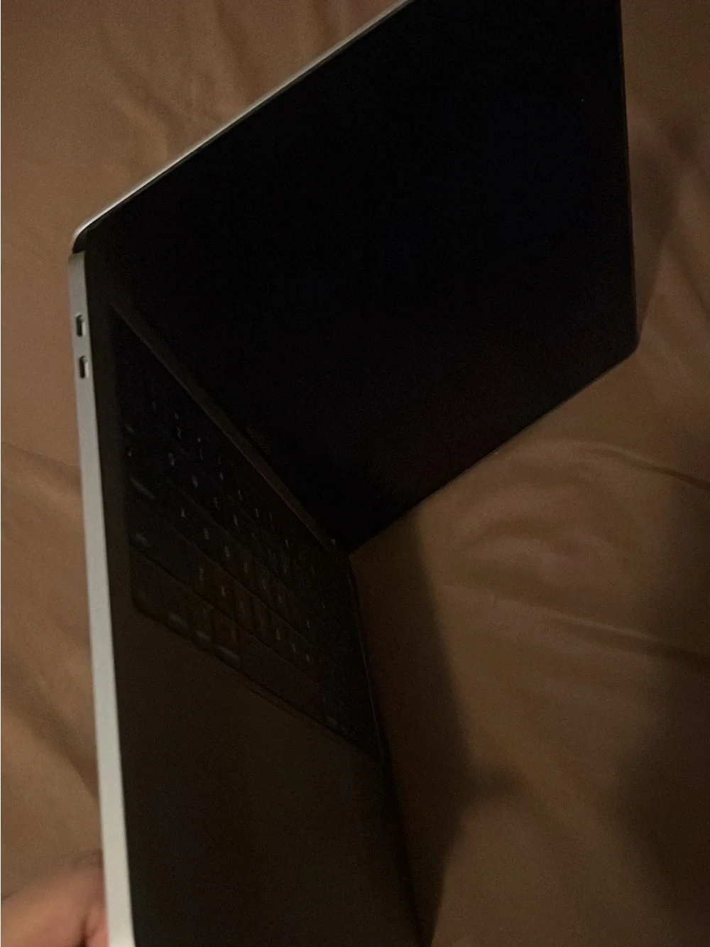 Apple MacBook Laptop in Silver with Black Apple Logo